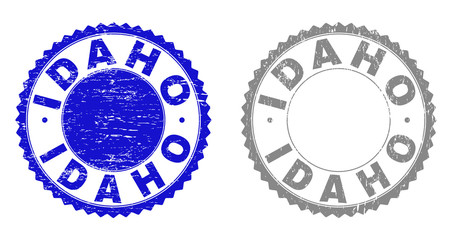 Grunge IDAHO stamp seals isolated on a white background. Rosette seals with grunge texture in blue and grey colors. Vector rubber stamp imitation of IDAHO title inside round rosette.