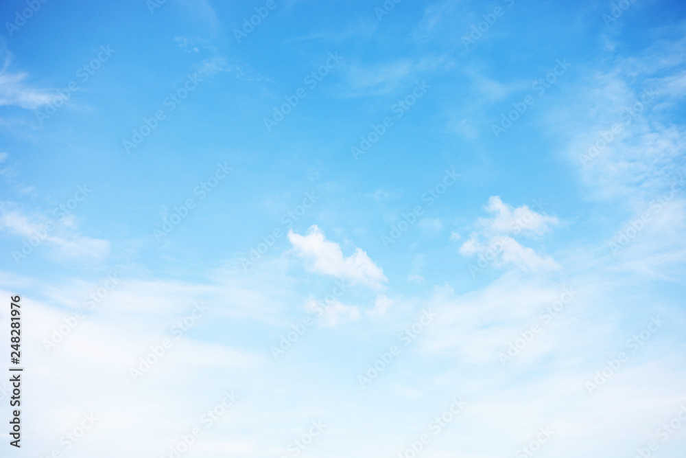 Wall mural blue sky background and white clouds soft focus, and copy space - Wall murals