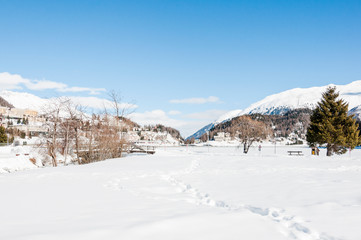 Fototapeta na wymiar St. Moritz, St. Moritzersee, Oberengadin, Winter, Wintersport, Winterwanderweg, Alpen, Graubünden, Schweiz