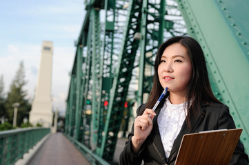 Fototapeta premium Asian business women happy for jobs succes,Asian women happy with her business and investment