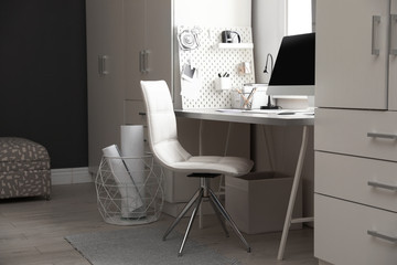 Light work place with computer at home. Interior design