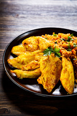 Roasted meat, groats and vegetables