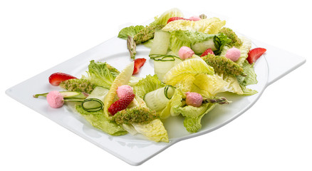 Salad with strawberries and sweet cheese on a white background. Diet dish