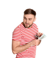 Portrait of young man counting money banknotes on white background