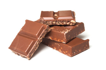 closeup of milk puffed rice chocolate blocks on white background