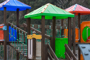 Fototapeta na wymiar Colorful playground on yard in the park