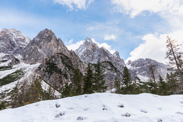 Fototapeta na wymiar Dolomites. Winter between ice and snow. Tre Scarperi Refuge. On the way to the Tre Cime di Lavaredo