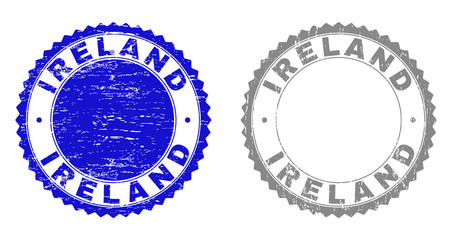 Grunge IRELAND stamp seals isolated on a white background. Rosette seals with grunge texture in blue and grey colors. Vector rubber stamp imprint of IRELAND tag inside round rosette.