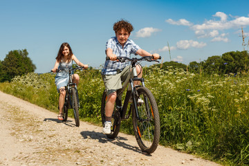 Fototapeta premium Urban biking - kids riding bikes