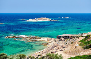 Naklejka na ściany i meble Beautiful beach and rocky coastline landscape in Greece