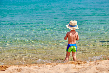 Fototapeta na wymiar Toddler boy on beach