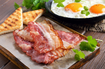 Appetizer fried bacon and toasts