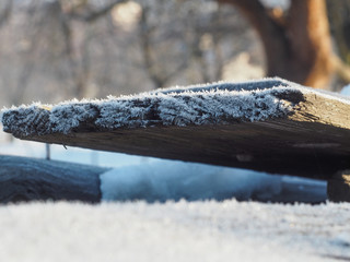A wooden board covered with frost