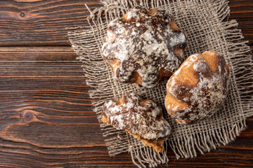 Traditional russian gingerbread on dark wooden background.