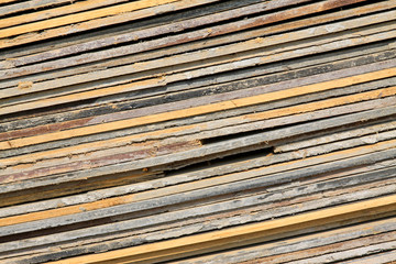 plank stacked together in a construction site