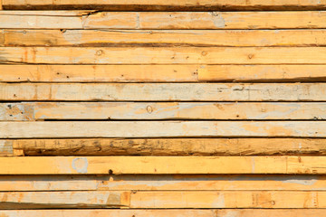 plank stacked together in a construction site