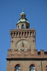 Clock In The Main Facade Of The Communal Palace In Piazza Maggiore In Bologna. Bologna Travel, holidays, architecture. March 31, 2015. Bologna, Emilia Romagna, Italy.