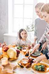 angry girl doesn't want to eat. close up photo. frustartion, bad behaviour at the table