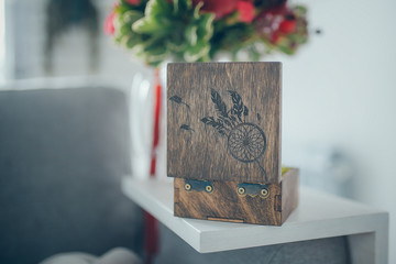 wooden wedding ring box and wedding bouqet