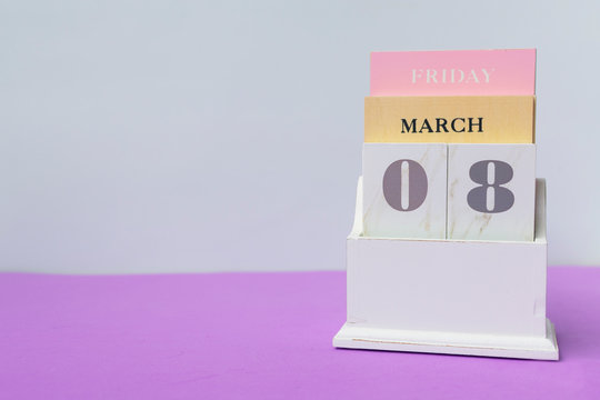 wooden calendar for March 8