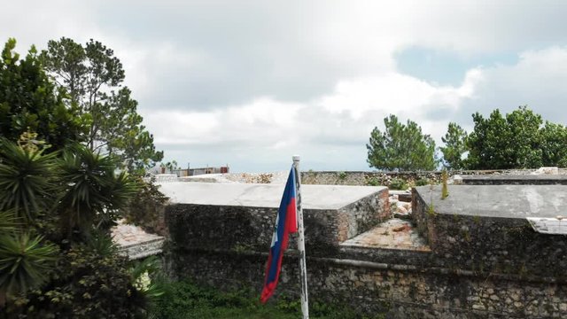Aerial View Stone Walls of Citadel in Haiti & Cloudy Sky Behind