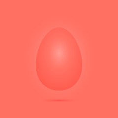 Easter egg in trendy shades, for experiments and inspiration in coral color. Playful festive style.