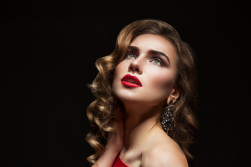 Fototapeta premium Woman with red lips on black background