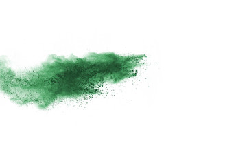 Green powder explosion on white background. Colored cloud. Colorful dust explode. Paint Holi.