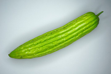 fresh bitter gourd on white background