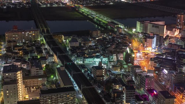 Tokyo, Japan at night with people and traffic at an intersection 4K
