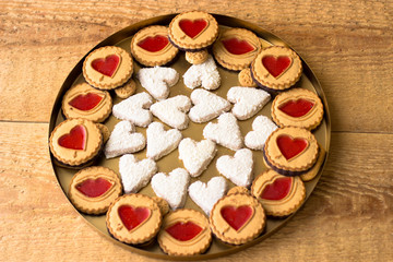 Obraz na płótnie Canvas Cookies with jelly hearts on wooden background.Valentine Day Concept.