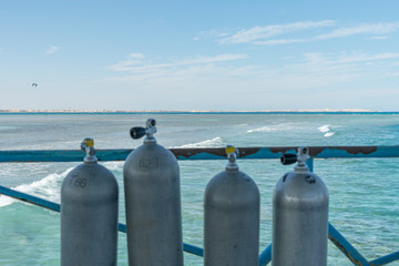 A lot of diving cylinders. oxygen cylinders outdoor. Oxygen cylinders for swimming in the...