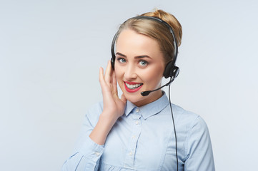 Happy smiling cheerful support phone operator portrait in headset