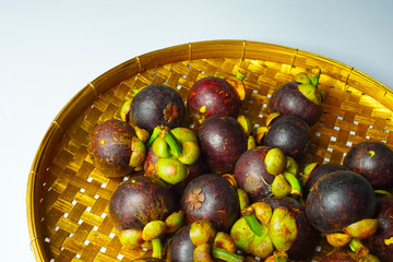 mangosteen on basket