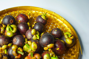 mangosteen on basket