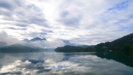 Time lapse beautiful landscape of mountain and lake with reflection in the morning