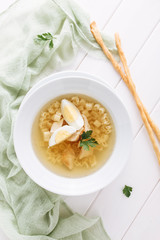 Chicken Pasta Soup with Egg Top Down Flat Lay