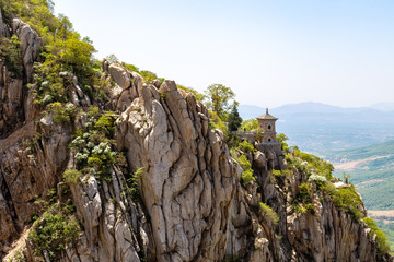 Sanhuang Basilica on a cliff on the top of Songshan Mountain, Dengfeng, Henan, China. Songshan is the tallest of the 5 sacred mountains of China dedicated to Taoism, near the famous Shaolin temple