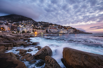 Wide angle view of a seascape scene in Seapoint in Cape town south africa - obrazy, fototapety, plakaty