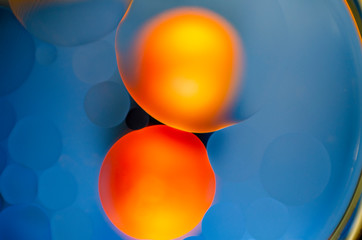 Yellow and red circles on blue water