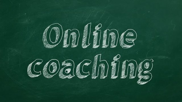 Hand drawing "Online coaching" on green chalkboard