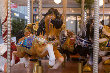 Fototapeta na wymiar Carousel with horses