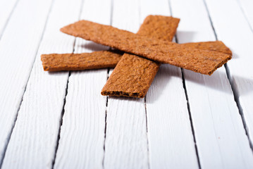 dog biscuits on white wood background