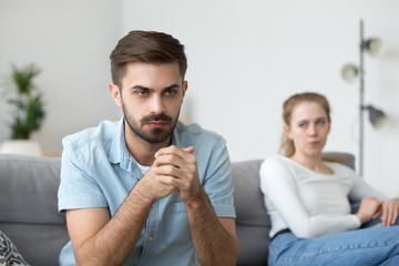 Stubborn angry husband avoid wife tired of family fights