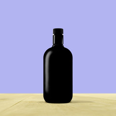 black bottle with blue background
