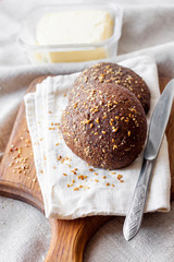 Homemade rye buns with linseeds, sesame and white poppy seeds