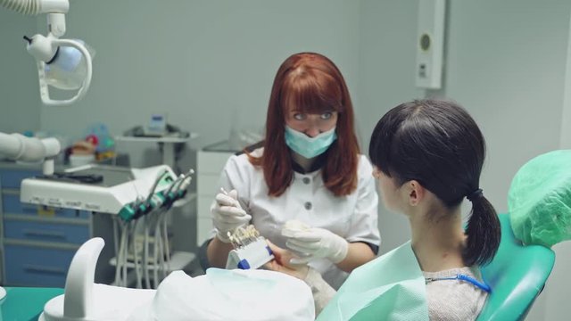 Woman having teeth examined at dentists. Dental clinic.