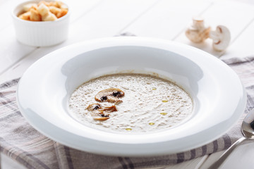 Mushroom Cream Soup in White Plate Side View