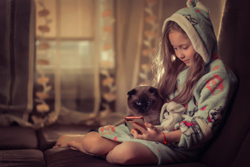 Obraz premium young woman with her cat
