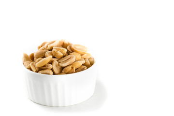 At the center of the frame white bowl with salted roasted peanuts on a white background. Roasted peanuts. Close. Horizontal shot.